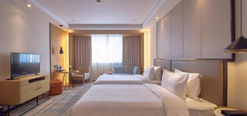 Wisdom Rose Hotel เซี่ยงไฮ้ ภายนอก รูปภาพ