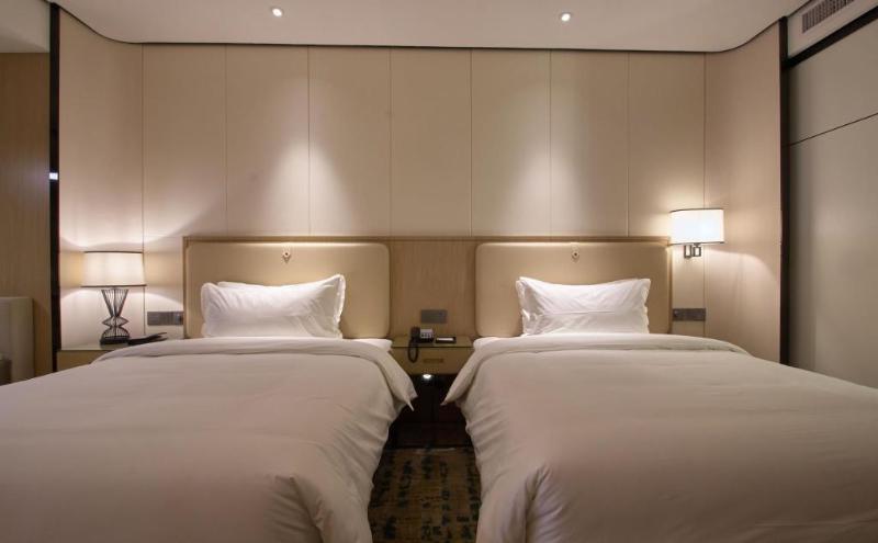Wisdom Rose Hotel เซี่ยงไฮ้ ภายนอก รูปภาพ